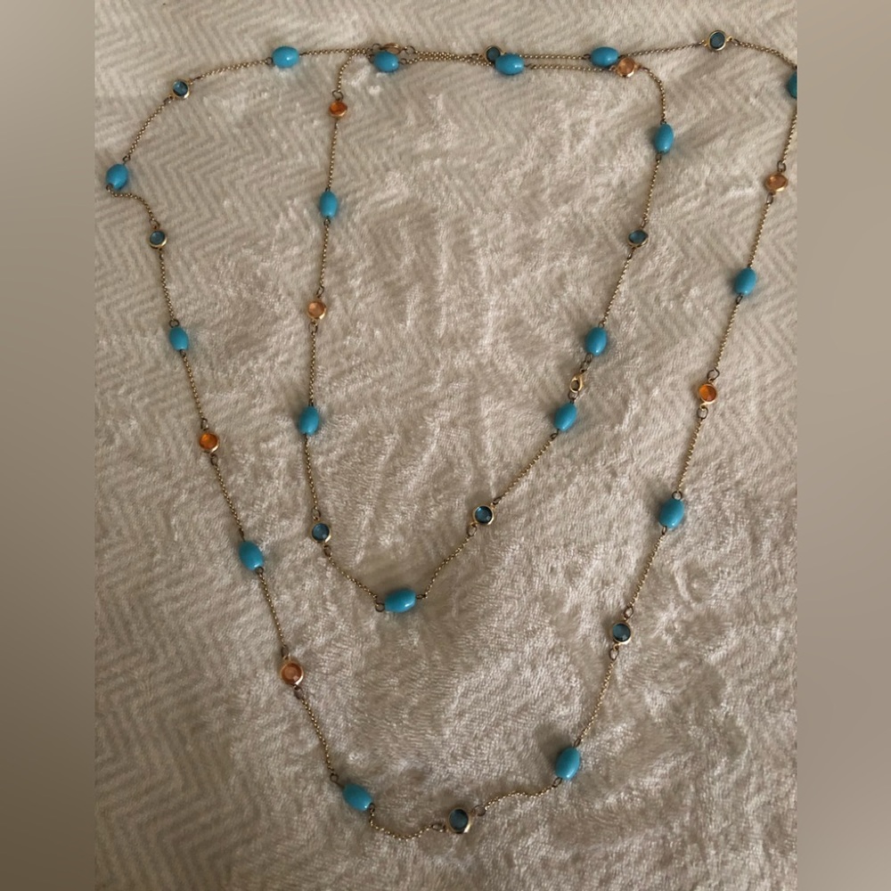 Stunning long layered beaded pendant, blues, peach, gold coloured chain